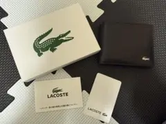LACOSTE 二つ折り財布 黒 レザーのサムネイル