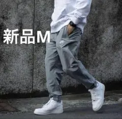 新品 NIKE ナイキ ウーブン ジョガーパンツ グレー 刺繍ロゴ