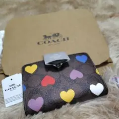 m*a様 COACH ハート柄 二つ折り財布