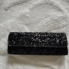 黒のスパンコールクラッチバッグ