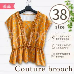 Couture brooch 花柄 フリル オレンジ リボン サテン トップス