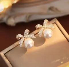 P-69.リボンパールピアス　ゴールド　韓国　大きめ　シルバー925