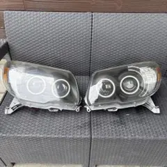 210系ハイラックスサーフ 後期 スモークヘッドライト 純正加工品