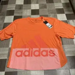 adidas オレンジ Tシャツ Lサイズclimaliteクロップド丈