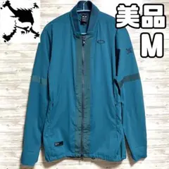美品 オークリースカル ジャケット メンズ M ウインドブレーカー