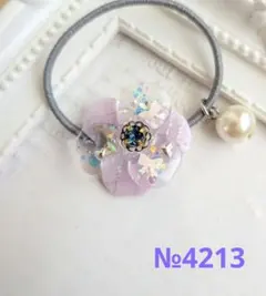 №4218 ラウンド型ビジューレジンヘアゴム - メルカリ