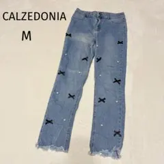 カルツェドニア リボン パール デニムパンツ M フリンジカット 青のサムネイル