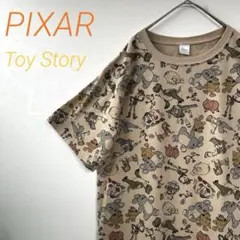 【匿名配送】ピクサー トイストーリー キャラクター柄 Tシャツ ベージュ 総柄のサムネイル