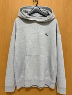 Calvin Klein グレー フード付きパーカー Lサイズのサムネイル