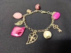 ♣♪濃いピンクの貝使いが可愛い天使ブレスレット♪