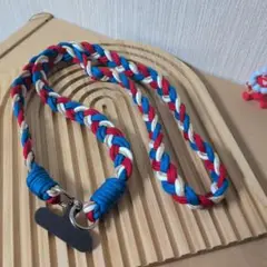 美品　スマホショルダー　青×赤　ミャクミャクカラー