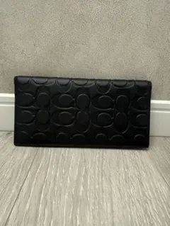 COACH シグネチャー エンボス 二つ折り財布 長財布ブラックのサムネイル