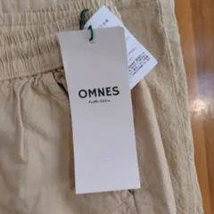 OMNES ベージュ イージーパンツ 1(M)