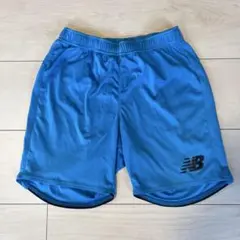 New Balance 水色ハーフパンツ
