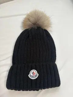 MONCLER ブラック ポンポンニット帽 - メルカリ