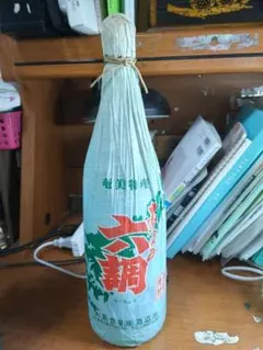 奄美特産 黒糖焼酎 あまみ六調大島食糧酒造所古酒1800ml30度のサムネイル