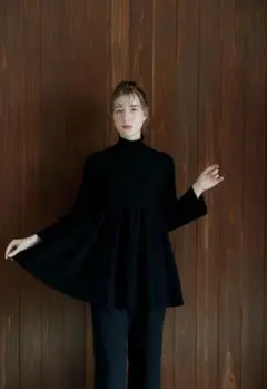 Acka peplum knit tops