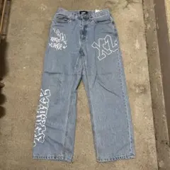 XLARGE グラフィティプリント デニムパンツ