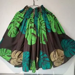 【美品】HAWAII　フラダンスパウスカート 黒地モンステラ柄 フリーサイズのサムネイル