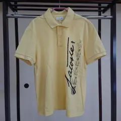 LACOSTEスクリプトブランドネームロゴプリントポロシャツ L (小さめ)