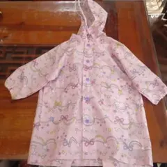 リボンと星柄のフード付きレインコート