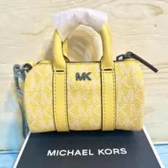 MICHAEL KORS ミニリュック イエロー スネーク柄 - メルカリ
