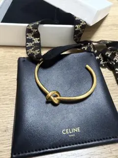 7/20まで　CELINE ノット エクストラシンブレスレット ゴールドのサムネイル