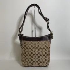 4621△ COACH シグネチャー ショルダーバッグ タッセル付 - メルカリ