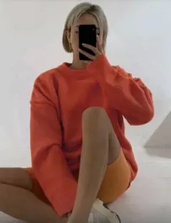 オレンジニット