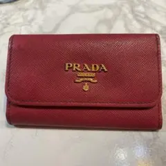 PRADA キーケース 6連 オレンジ 三つ折り - メルカリ