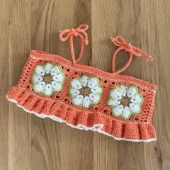 アフリカンフラワーモチーフのかぎ編みオレンジビスチェ キッズ〈90〜100cm〉