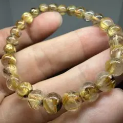 103 金運勝負運　z6328 ゴールドタイチンルチルクォーツ