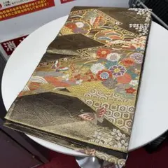 シックなカーキ色の秋野光悦垣文　唐織袋帯 シックなカーキ色の秋野光悦垣文 唐織袋帯の通販 by にゃんこ日和｜ラクマ