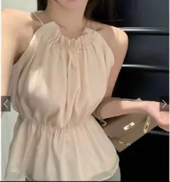 ホルターネックオーガンジーペプラムトップス