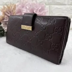 GUCCI シマレザー GG ロゴプレート 長財布 フラップ 291099 - メルカリ