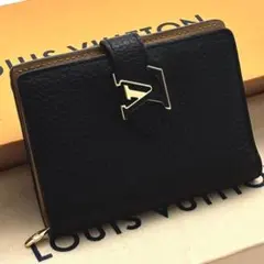 未使用に近い】ルイヴィトン LVヴェルティカル コンパクト トリヨン 二