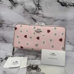 (未使用品)大人気、コーチ、長財布、ラウンドジップ、PVC地、シボ革、ハート柄