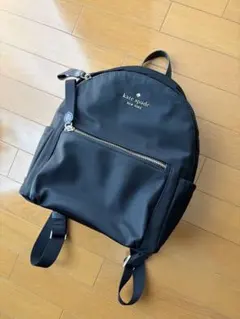 新品】kate spade ネイビー スカラップリュック 猫ポーチ付き - メルカリ