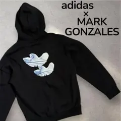 adidas×MARK GONZALES シュムーフォイルモニュメントパーカー