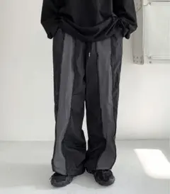 FOLLOWIN Y2Kウェーブジッパーユニーク配色ナイロントラックパンツ　黒