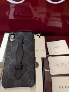 新品 GUCCI iPhoneケース GGスプリーム ハンドストラップ付