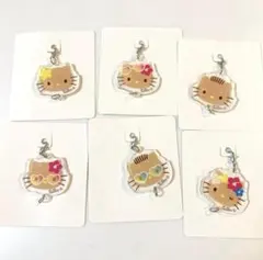セリア　サンリオ　ハローキティ　日焼けキティ　アクリルミニチャーム　キーホルダーのサムネイル