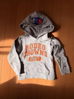 RODEO CROWNS × Champion パーカー100 オレンジロゴ