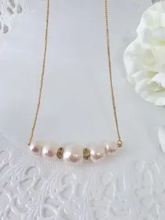 ピンクコットンパールとゴールドロンデルのネックレス