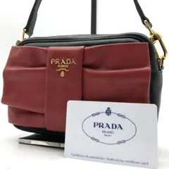 ✨美品✨プラダ ショルダーバッグ メタルロゴ ゴールド金具 リボン オールレザー