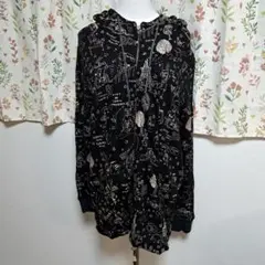 SCOLARのキラキライラストのパーカー