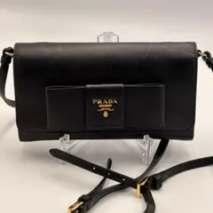 プラダ ショルダーウォレット 長財布 サフィアーノレザー リボン ロゴ