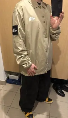 THE NORTH FACE ベージュ色ナイロンジャケット　コーチジャケット