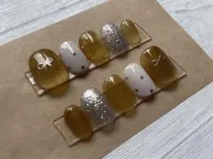 ネイルチップ　イエロー　黄　リボン　ベリーショート　手描き　推し活　ちゅるんマグ