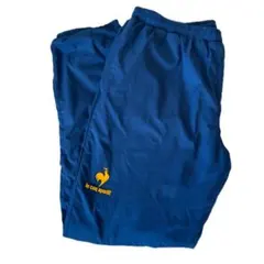 【le coq sportif 】ナイロンパンツ ブルー イエローロゴ